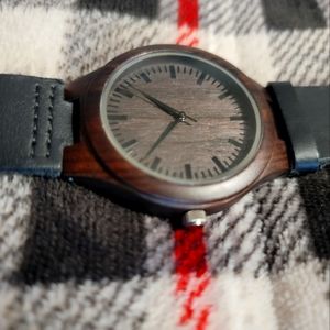 Engraved wooden watch